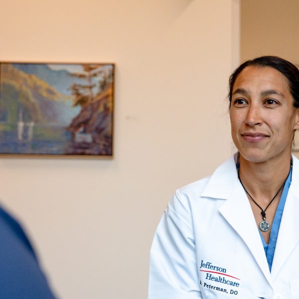 Doctor speaks to patient